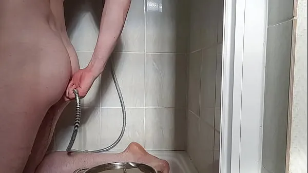Big plug in the ass and enema in a bowl video 1 of 3 warm Videos